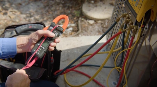 technician working on AC