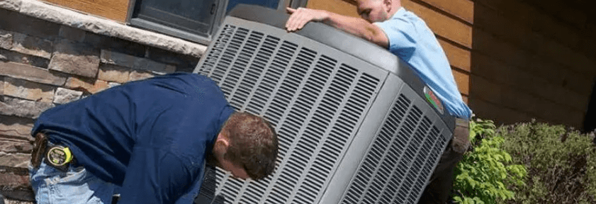 technicians installing hvac unit