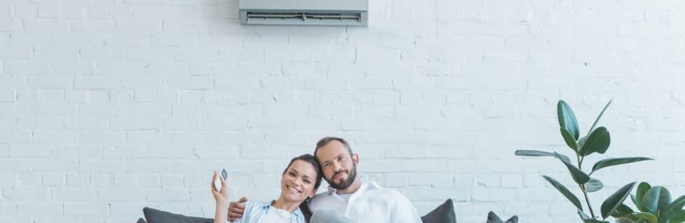 couple sitting on couch comfortable