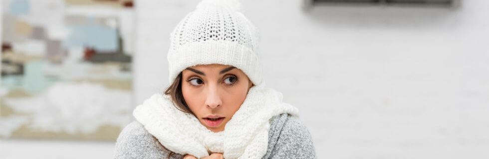 woman bundled up in the snow