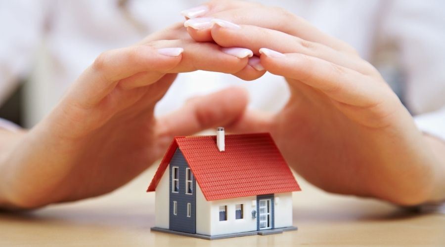 hands over tiny house